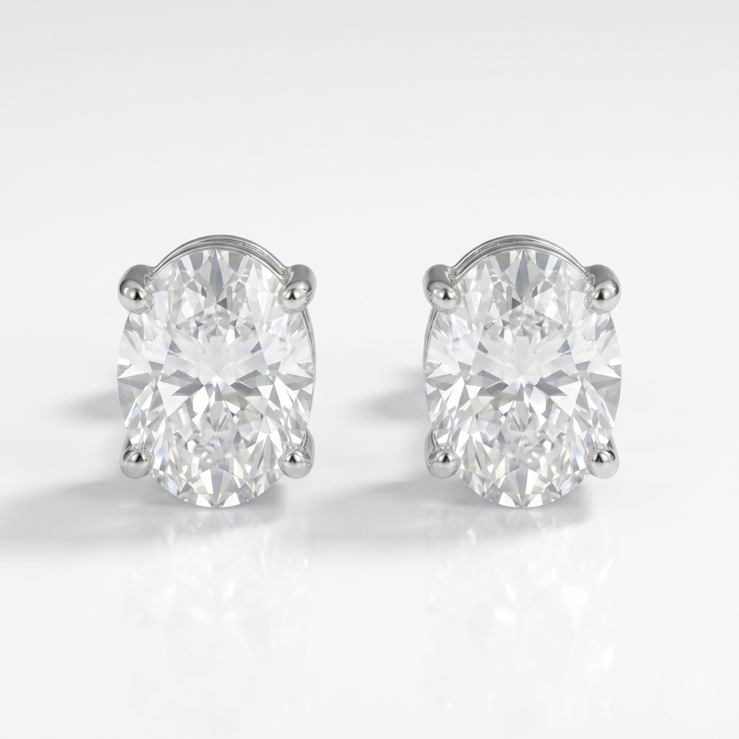 Evergreen Oval Solitaire Earrings