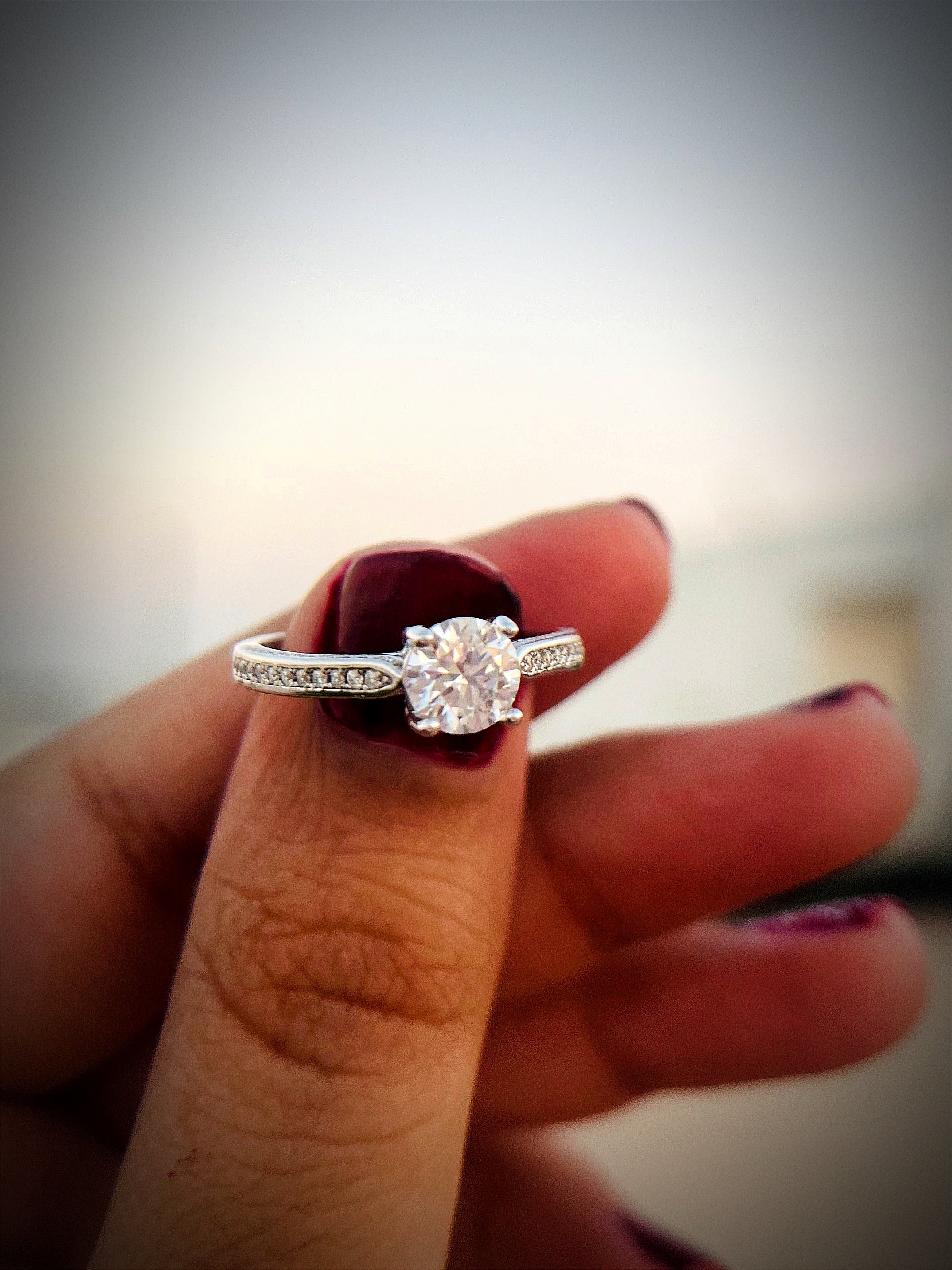 Round Solitaire With Studded Band