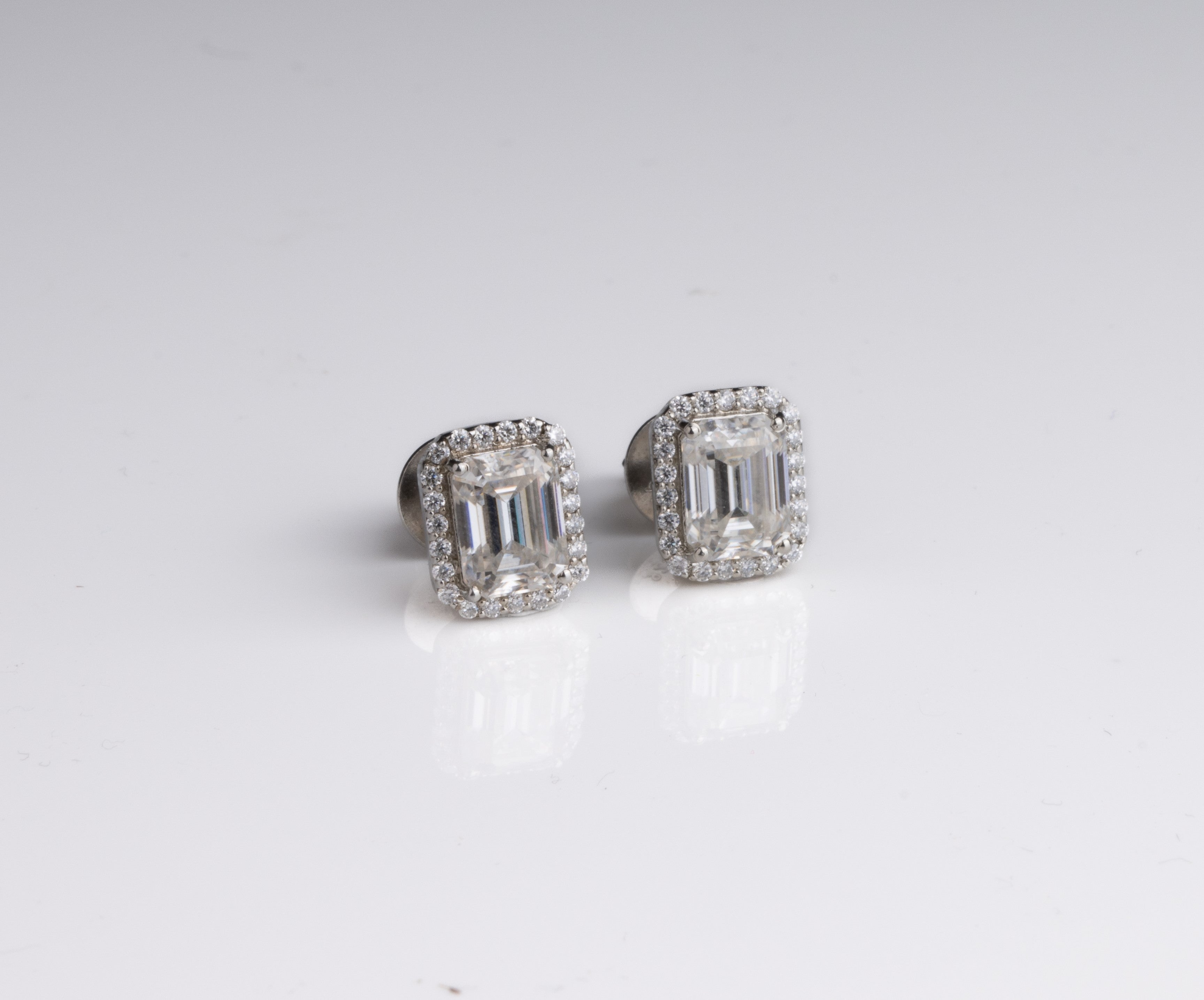 Glowing Halo Emerald Earrings