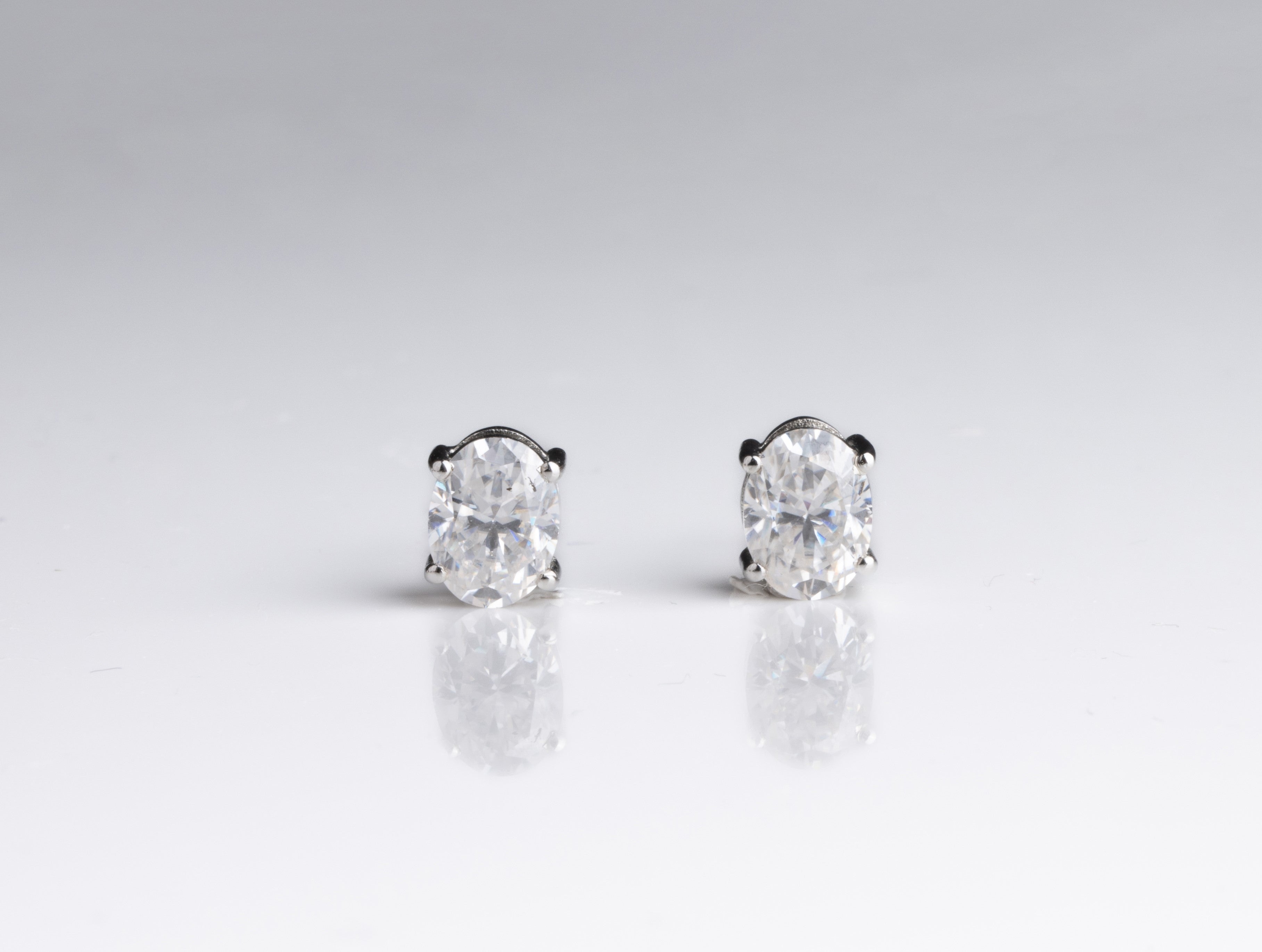 Evergreen Oval Solitaire Earrings