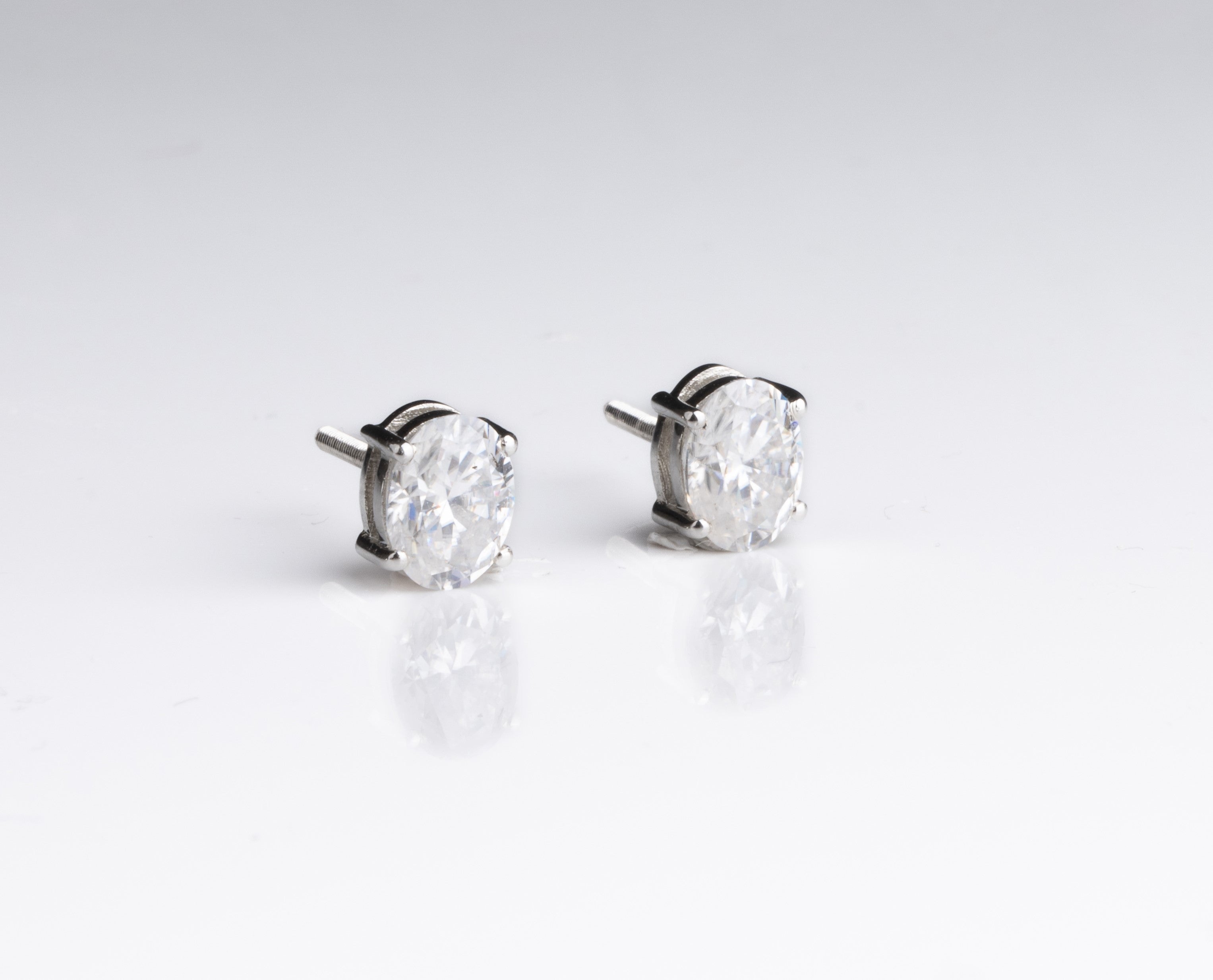 Evergreen Oval Solitaire Earrings