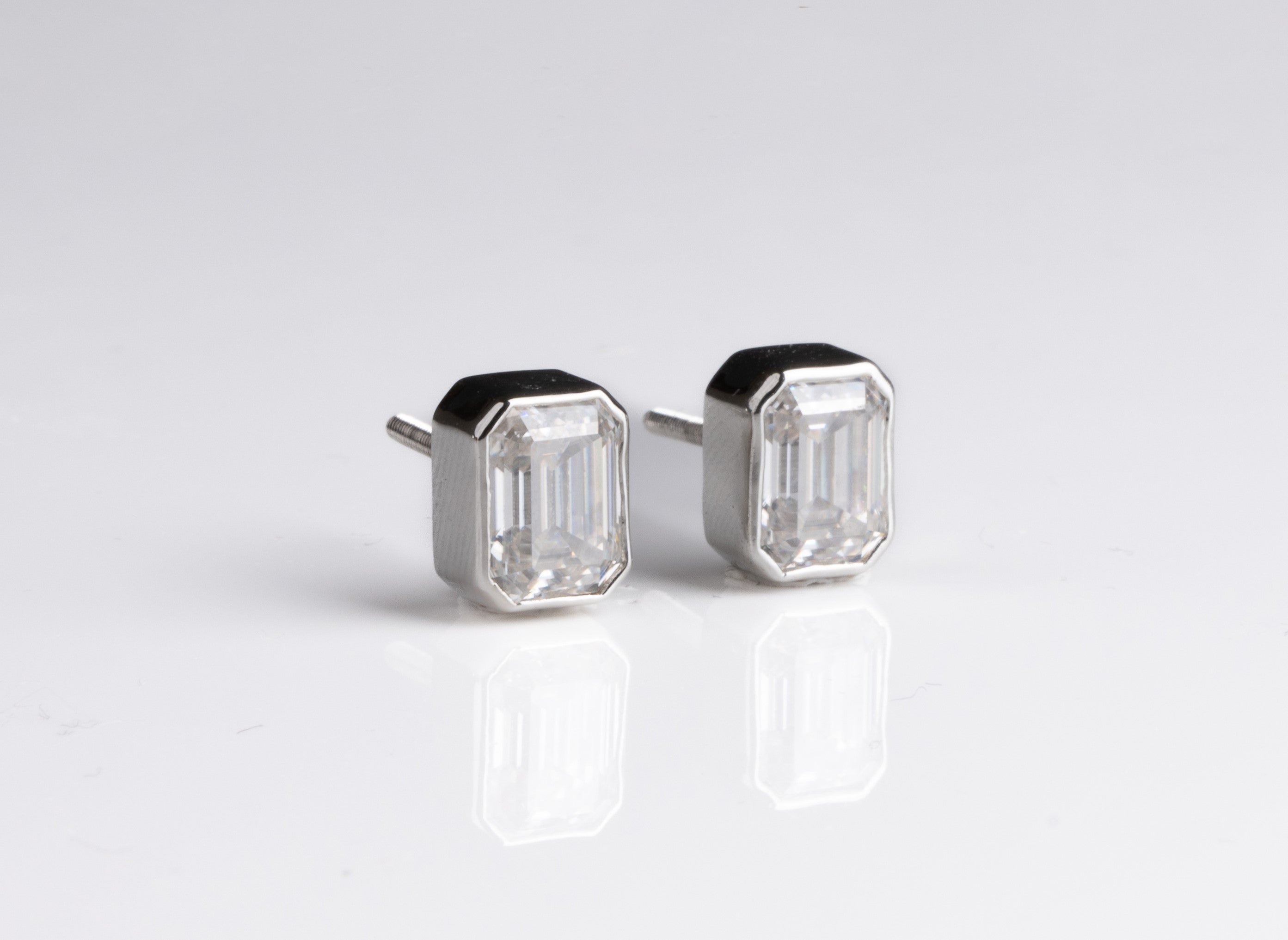 Bezel Studded Emerald Earrings