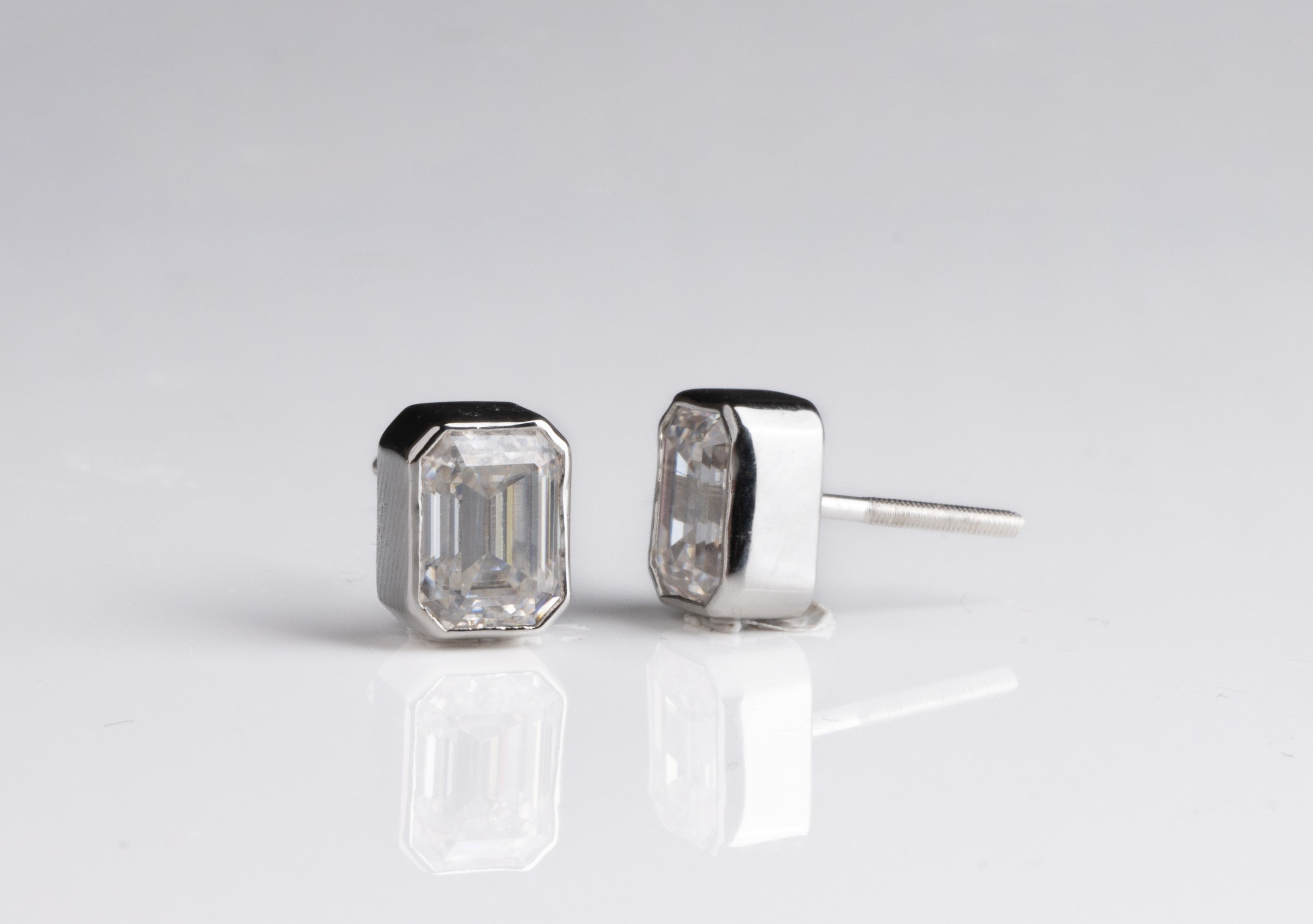Bezel Studded Emerald Earrings
