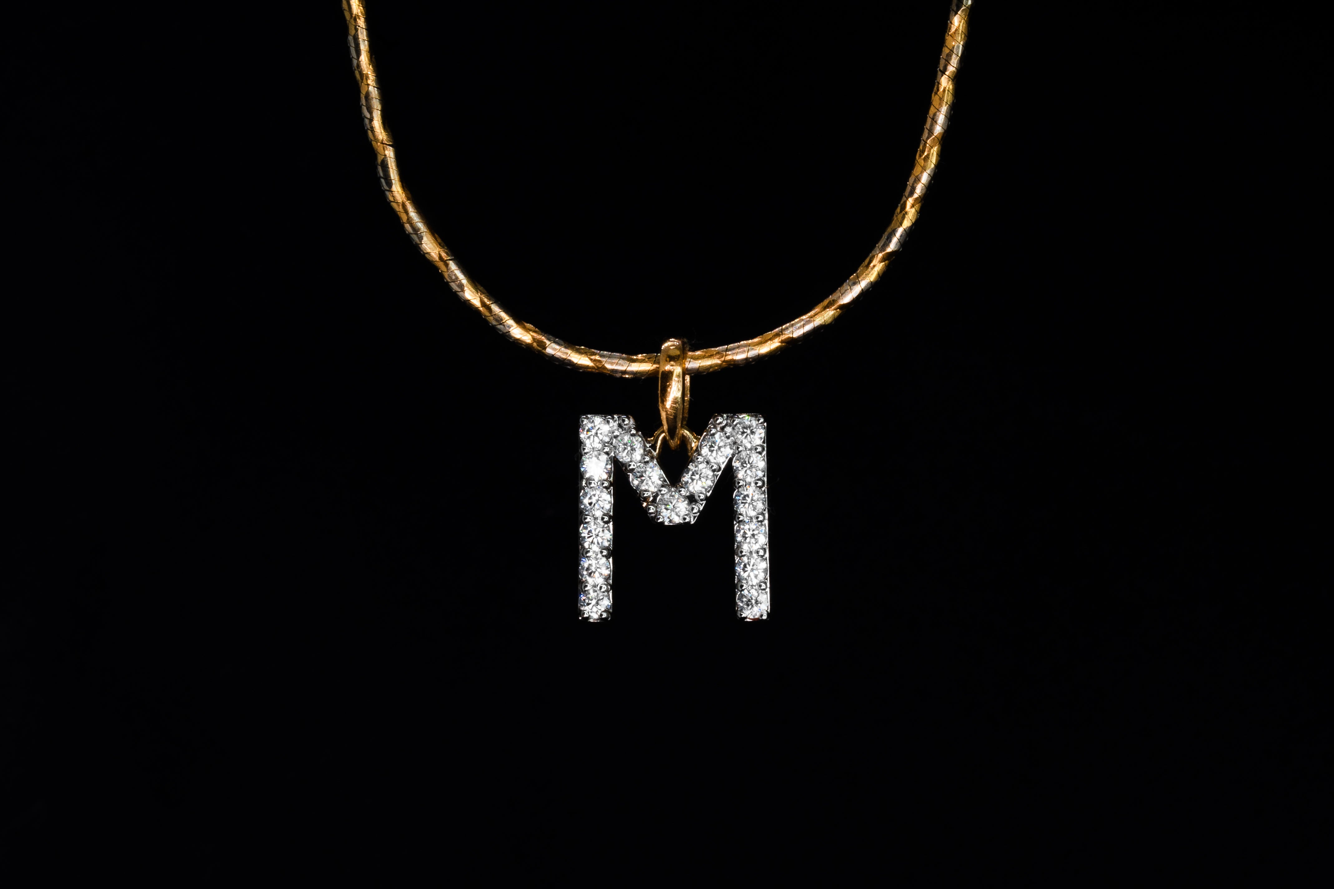 Solitaire Waves M Alphabet Moissanite Pendant